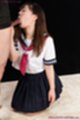 Yamamoto erena on her knees in uniform sucking cock